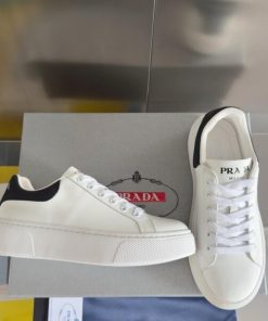 PRADA MACRO RE-NYLON AND BRUSHED LEATHER SNEAKERS - PRD065